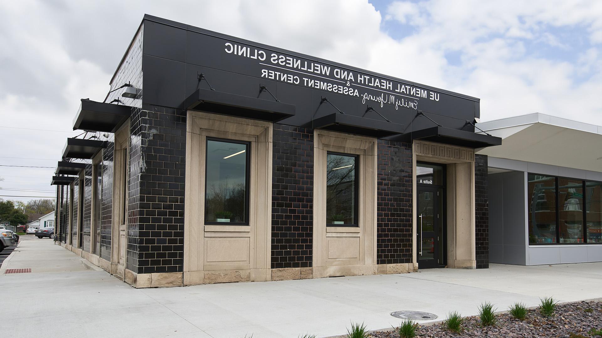 Mental Health and Wellness Clinic in partly cloudy sky